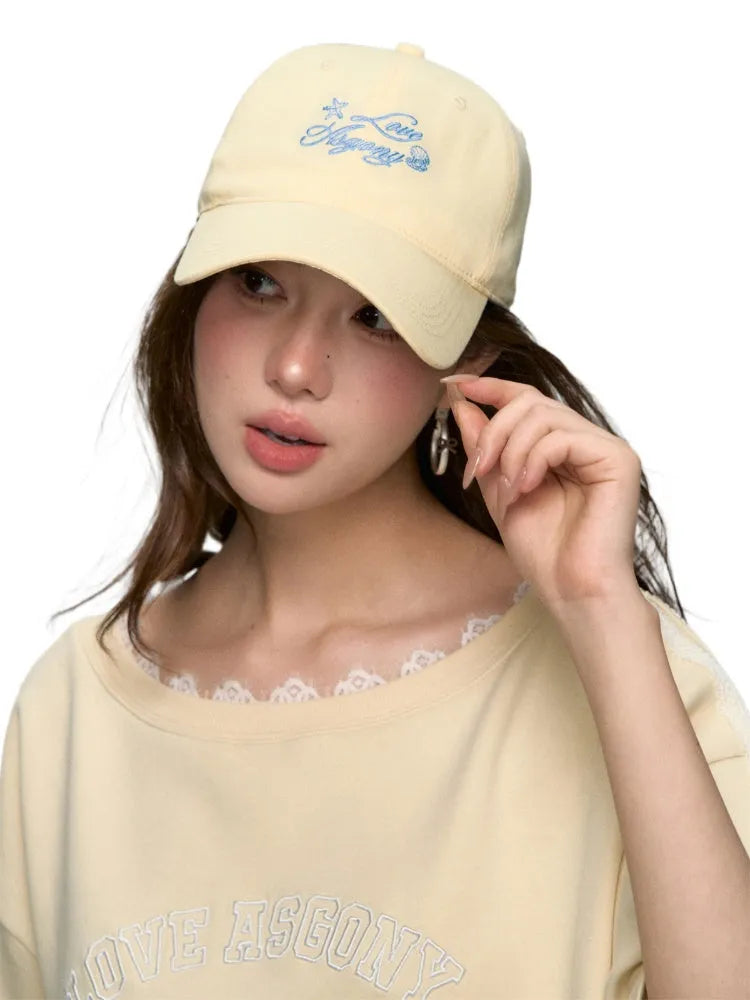 Cream-colored Embroidered Visor Cap